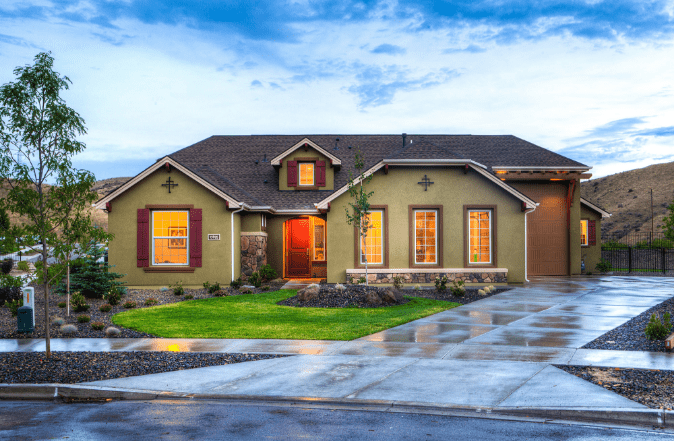 House at sunset with new roof by Daniel hood Roofing