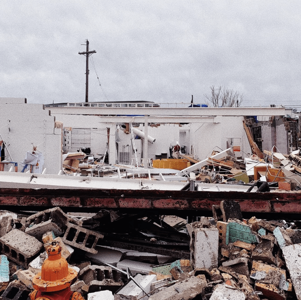 roof and houses in shambles after storm