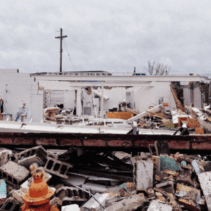 roof and houses in shambles after storm